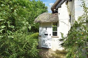 The entrance to the thatched cottage going to auction next month. Picture: Rightmove and Nock Deighton.