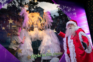 A man dressed as Santa Claus outside Selfridges in London as the department store unveils its Christmas windows on Oxford Street. This year's display is themed around 'Christmas of Dreams'. Photo: Aaron Chown/PA Wire