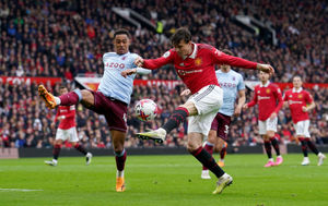 Manchester United's Victor Lindelof has an attempt on goal past Aston Villa's Jacob Ramsey