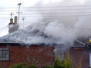 Supporting image for story: Residents flee in blaze drama