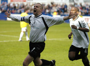 Sean Parrish celebrates scoring the goal that gave the Bucks promotion in 2005.