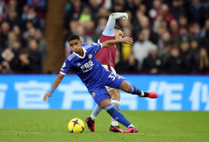 Aston Villa's Emiliano Buendia tackles Leicester City's Tete (front)