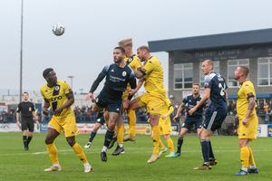 Zak Lilly looking to get a head on the ball from a cross. (photo Kieren Griffin)