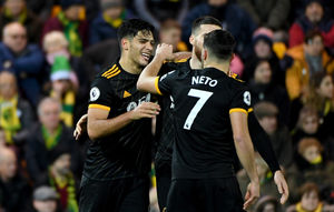 Raul Jimenez is congratulated by Pedro Neto (AMA)