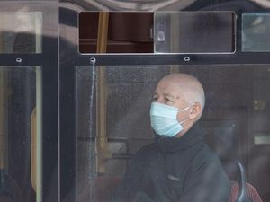 Supporting image for story: Public should wear face coverings on public transport, health minister says