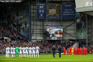 Players and supporters take part in a minute's applause at The Hawthorns in memory of Pierce and Tracey Wilkinson