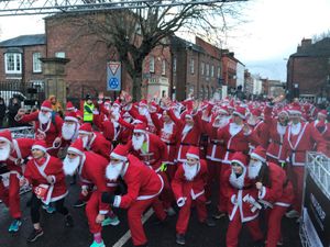 Supporting image for story: Hundreds of Santas take to the streets of Oswestry for fun run
