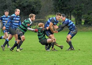 Market Drayton RFC (Green) v Shrewsbury (Blue) at Greenfields, Market Drayton.Jamie Clare holds on to the ball for Shrewsbury