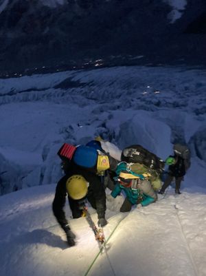 Climbing through the Khumbu Icefall at night