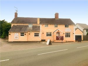 Supporting image for story: Five-bed salmon-coloured pub near Shrewsbury for sale as owners look to retire abroad