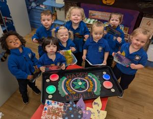 Little Trinity Nursery children delighted with their Diwali celebration creations.
