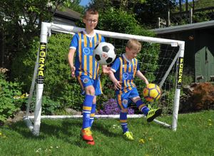 Dougie with his older brother, Reuben, 9