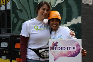 Laura Rogers and Rufsana Begum celebrate completing the abseil. Photo: Nkh_photography