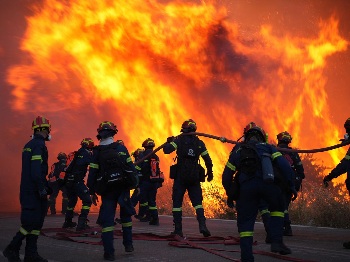 More than 100 firefighters battle large wildfire on Greek island