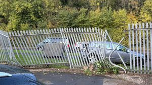 The car caused significant damage to the fencing outside the business.