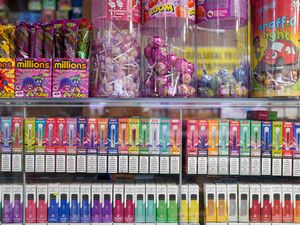 Disposable vapes of varying flavours on sale in a store