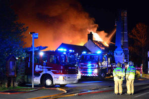 Firefighters tackle the blaze at the Tayleur Arms