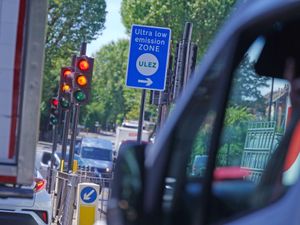 An information sign for the ultra-low emission zone on Brownhill Road in Lewisham, south London