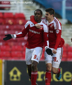 Nile Ranger of Swindon Town celebrates with Raphael Rossi Branco of Swindon Town after scoring to make it 2-1