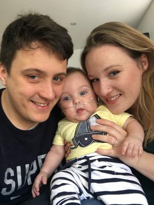 Mikaela and David Cox when Reggie was born