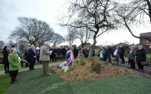 The unveiling of the plaque in Tipton Cemetery