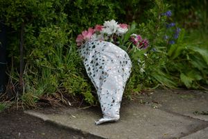 Flowers left in tribute at Beacon Lane