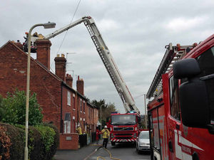 Supporting image for story: Drama as road closed for crane to put out Shifnal chimney fire