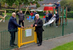 SHREW COPYRIGHT SHROPSHIRE STAR STEVE LEATH 10/10/2020..Pic in Hadnall near Shrewsbury, at the opening of the new play area. Cutting the ribbon is long standing community figure: 91 year old: Tom Slack. With him at the front is Cllr: James Slater (Chairman), and at the back are Councillors: Barrie Davies, John Harrison, and Toms Great Grandchildren : Zak Webb 4, Zara Webb, and family members..