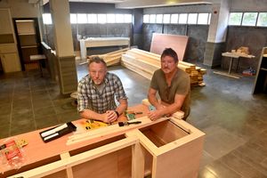 Andy Evans and Nicc Bennett stand at what will be the bar of their new venue