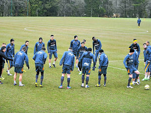 Supporting image for story: Wolves players limber up for crunch clash at Bolton