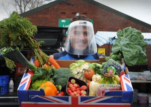Selling with Covid-19 safety measures in place, Scott Robson, of Wolverhampton, from Online Fruit and Veg, during Lydham Friday Market, at Lydham & More, Village Hall, Lydham, Bishops Castle