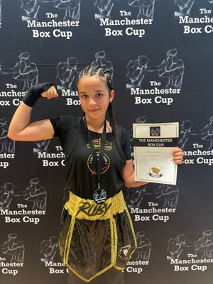 Telford's Ruby Hussain with her gold medal at the Manchester Box Cup