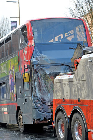 A passenger on the bus described how the bus seemed to go out wide, then turn into the shop
