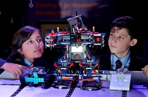 Charlton School (Wellington) pupils Dylan Rathod and Alfie Murdoch with robots at the showcase event in 2016