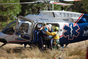 A woman is carried into a helicopter after being rescued off El Capitan on Thursday
