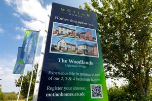 Motion Homes signage at The Woodlands, Lightmoor Village