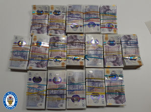 The £85,000 recovered from a vehicle
