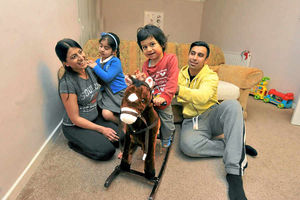 Gaurav at home with his family before he had the transplant