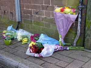 Floral tributes near the scene in Paradise Road, south London.