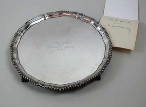 The silver salver and note signed by Sir Winston Churchill.