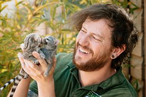Scott Adams, owner of Telford Exotic Zoo, with two new baby Genets, born at the centre in the past two weeks.