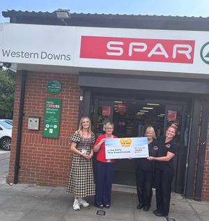 Midlands charity, YESS, receiving cheque from SPAR Western Downs