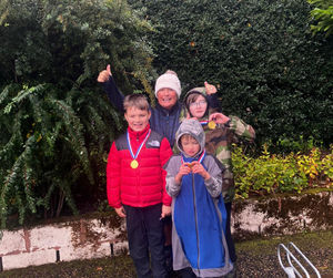 Heather after her family fundraising walk with grandchildren Zach, Max and Alex.