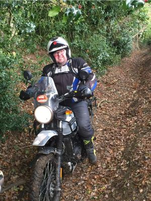 Before losing his weight on his bike 