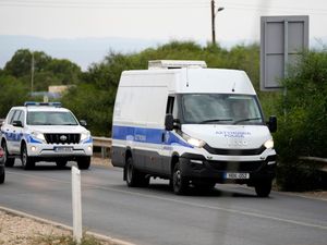 A Cyprus police van and police car