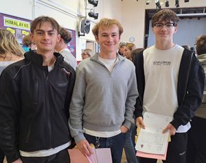 Oliver Baker, Daniel Harris and Miles Dennison celebrating their exam results