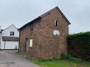 Supporting image for story: Plans to convert redundant barns behind former village post office into homes come under fire from neighbours
