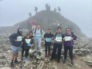 Supporting image for story: Home Visits team scales new heights for charity