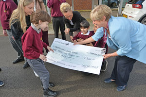Tettenhall Wood School came in fourth in our Cash for Schools competition. Pictured: head of school Helen Masters with the school council and sponsors.