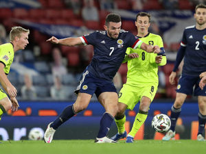 Supporting image for story: Aston Villa midfielder John McGinn proud to skipper Scots